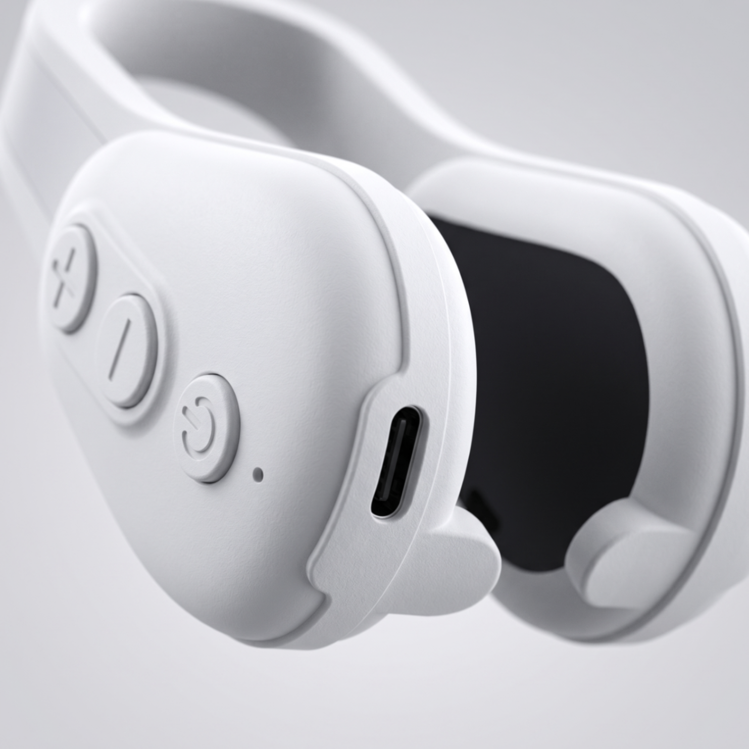 Close-up side detail of Sculpté showing the charging port and button controls